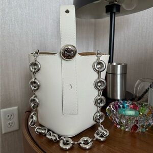 Loewe Mini Pebble Bucket bag in soft grained calfskin with short donut chain